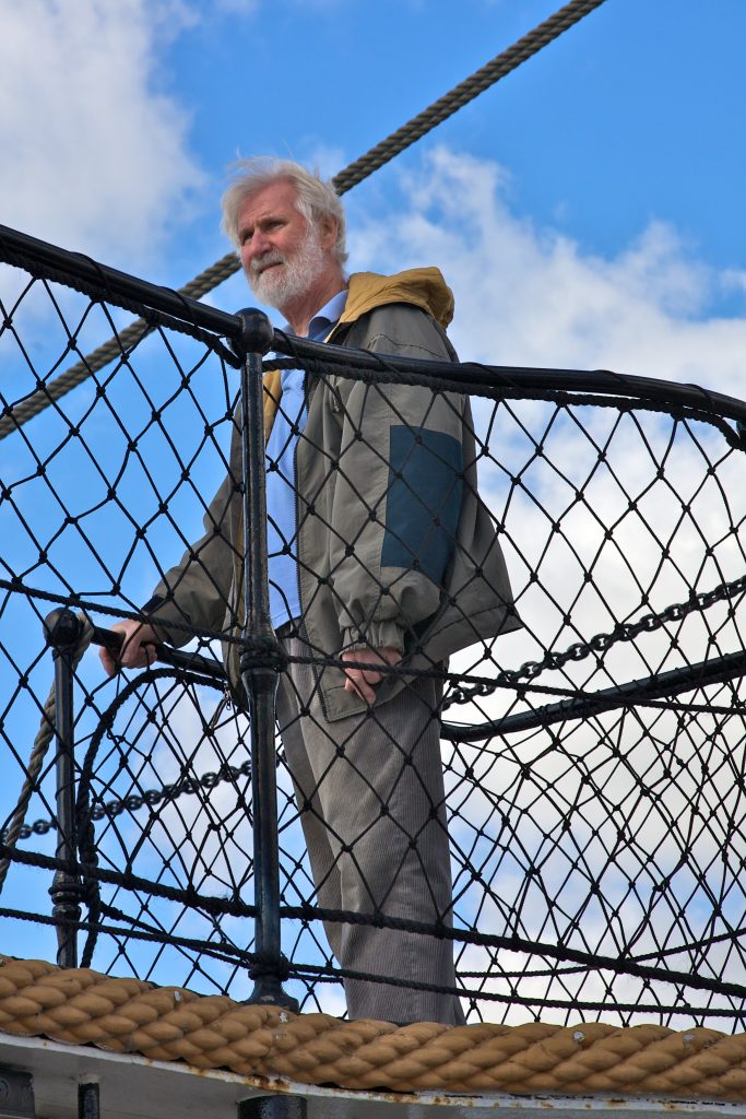 Tony McDevitt on the bridge of HMS Warrior - 2012.